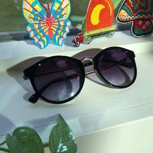 Gold and black sunglasses